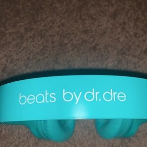 beats headphones teal color with case